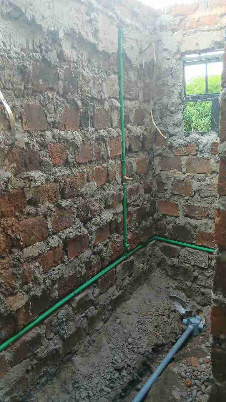 Full Bathroom Remodel — Rough-In to Finish — Before — supply lines roughed in
