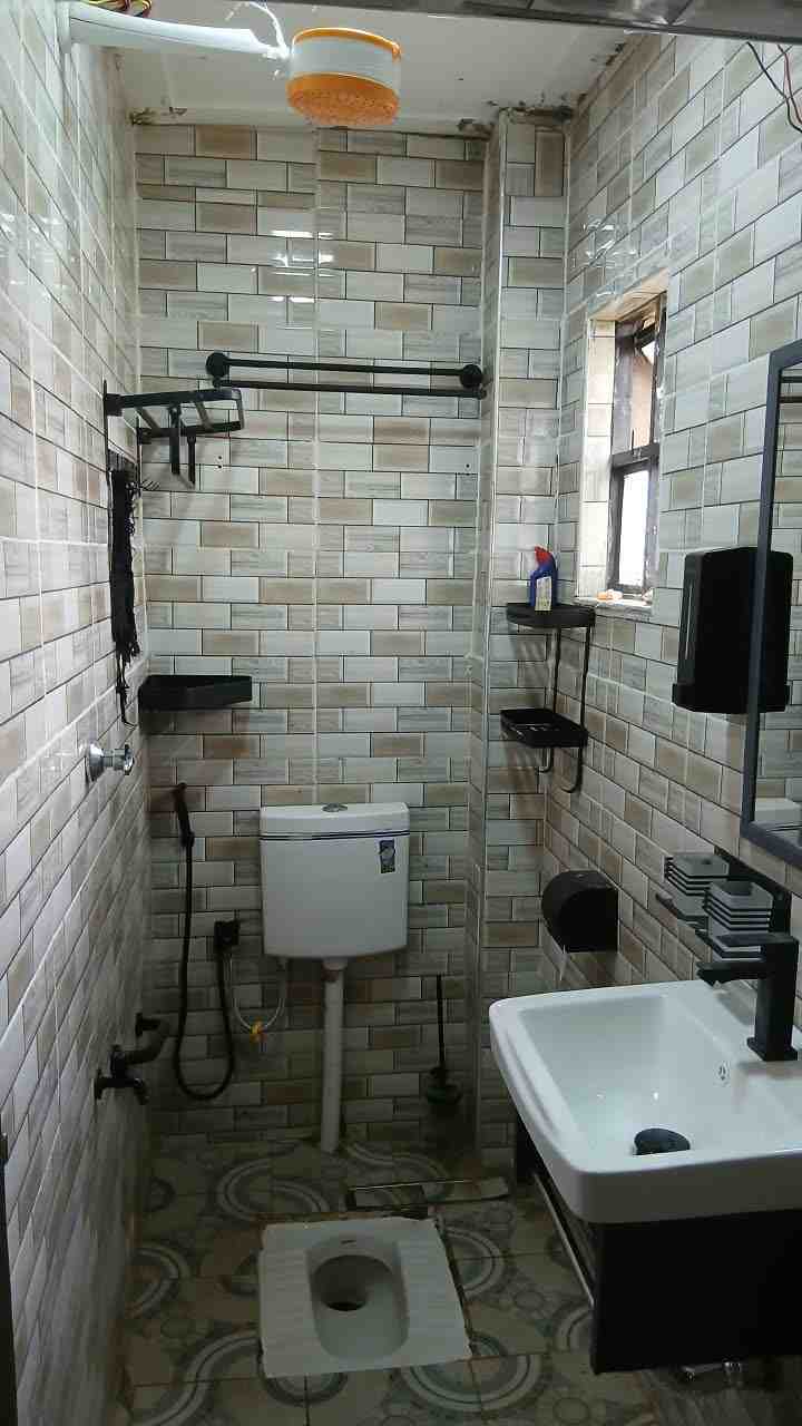 Full Bathroom Remodel — Rough-In to Finish — After — tiled shower area and squat toilet